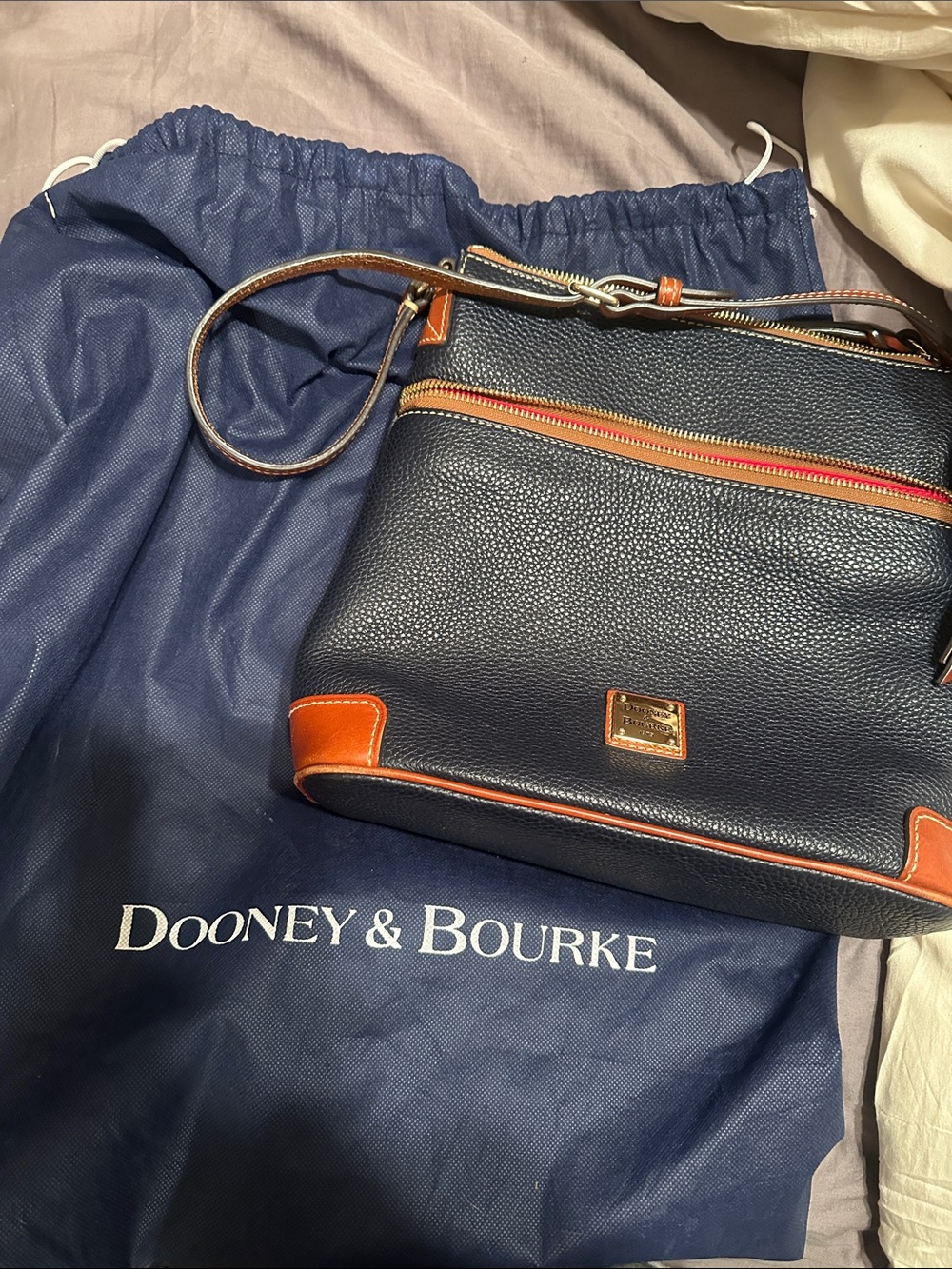 Dooney & Bourke Navy Pebbled Leather Messenger with Tan Trim